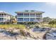 Lovely beach home featuring multiple screened-in patios, offering the perfect blend of indoor/outdoor living at 7470 Palm Island Dr # 2813, Placida, FL 33946