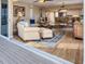 Spacious living room with comfortable seating, a ceiling fan, and sliding glass doors at 7470 Palm Island Dr # 2813, Placida, FL 33946