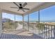 Relaxing screened-in porch offering stunning ocean views and a refreshing breeze at 7470 Palm Island Dr # 2813, Placida, FL 33946