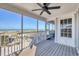 Breezy screened-in porch with coastal views and a bicycle to enjoy the neighborhood at 7470 Palm Island Dr # 2813, Placida, FL 33946
