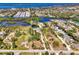 Waterfront lot on a canal, shown in aerial view with boundary lines marked in white at 760 S Oxford Dr, Englewood, FL 34223