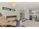 Inviting entryway featuring a chandelier, hardwood floors, and stylish furnishings at 760 S Oxford Dr, Englewood, FL 34223