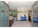 Welcoming foyer with tile flooring, a view to the water, and a coastal decor at 760 S Oxford Dr, Englewood, FL 34223