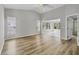 Large, bright living room with new wood flooring and high ceilings at 821 Montrose Dr # 201, Venice, FL 34293