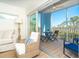 Relaxing balcony with comfortable seating and scenic views, perfect for outdoor enjoyment at 8413 Placida Rd # 205, Placida, FL 33946