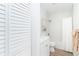 Clean bathroom featuring a combination shower/tub and built in laundry, perfect for efficient living at 8413 Placida Rd # 205, Placida, FL 33946