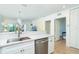 Open dining area flowing into the living room and kitchen with modern appliances and decor at 8413 Placida Rd # 205, Placida, FL 33946