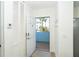Bright entryway with tile floors and a view of the outdoors through the open front door at 8413 Placida Rd # 205, Placida, FL 33946