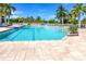 Large, inviting community pool with plenty of space for swimming and lounging under the sun at 8413 Placida Rd # 205, Placida, FL 33946