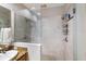 Spa like bathroom with a glass enclosed shower and handheld shower fixture at 8500 Amberjack Cir # 102, Englewood, FL 34224