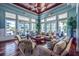 An inviting and elegant living room, featuring comfortable seating, natural light, and a stylish design for relaxation and entertaining at 8500 Amberjack Cir # 102, Englewood, FL 34224