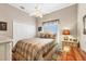 Cozy bedroom with a comfortable bed and closet space at 9574 Arsipe Cir, Port Charlotte, FL 33981