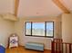 Bedroom featuring a large window with views of the water at 9580 Almirate Ct, Placida, FL 33946