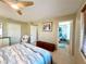 Bedroom featuring an attached bathroom with a turtle themed shower curtain at 9580 Almirate Ct, Placida, FL 33946