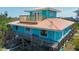 Charming beach house with a cozy deck, offering scenic views and tranquil coastal living at 9580 Almirate Ct, Placida, FL 33946