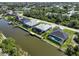 An aerial view of homes on a canal system with docks at 10115 Long Branch St, Port Charlotte, FL 33981