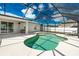 Inviting pool with screened enclosure offering a relaxing outdoor experience at 10164 Stonecrop Ave, Englewood, FL 34224