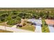 Spacious single-Gathering home with a private pool, lush backyard, and serene views of the surrounding landscape at 10182 Charlemont Ave, Englewood, FL 34224
