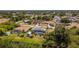 Community aerial shot featuring private pools, lush landscaping and waterfront views at 10182 Charlemont Ave, Englewood, FL 34224