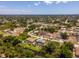 Community aerial featuring mature trees, private pools, and waterfront views at 10182 Charlemont Ave, Englewood, FL 34224