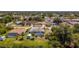 Aerial view of a neighborhood with private pools, lush landscaping and waterway views at 10182 Charlemont Ave, Englewood, FL 34224
