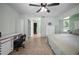 Large bedroom with windows, access to closets, and a spacious layout for comfortable living at 10182 Charlemont Ave, Englewood, FL 34224