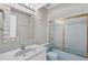 Bathroom with a vanity and a shower with sliding glass doors at 1035 Riggs St, Port Charlotte, FL 33952