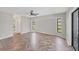 Open living room with tile floors and large windows at 1035 Riggs St, Port Charlotte, FL 33952