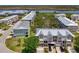 Townhouses and condo buildings surround a small pond in this neighborhood at 10411 Coral Landings Ln # 85, Placida, FL 33946