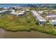 Townhouses and condo buildings near mangroves and residential areas at 10411 Coral Landings Ln # 85, Placida, FL 33946