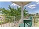 Enjoy neighborhood views from this inviting balcony at 10411 Coral Landings Ln # 85, Placida, FL 33946