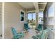 Inviting balcony with comfortable seating and neighborhood views at 10411 Coral Landings Ln # 85, Placida, FL 33946