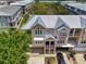 Beautiful townhouse with a metal roof, multiple balconies and a two-car garage at 10411 Coral Landings Ln # 85, Placida, FL 33946