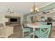 Open floor plan with kitchen, dining, and living areas, great for entertaining and Gathering time at 10411 Coral Landings Ln # 85, Placida, FL 33946