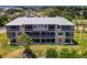 Townhouse with covered patios and an outdoor living space at 10411 Coral Landings Ln # 85, Placida, FL 33946
