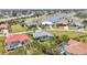 Scenic aerial shot overlooking lovely homes with pools and golf course in the background at 11 Amberjack Ln, Placida, FL 33946