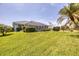 Spacious backyard with screened lanai perfect for enjoying the outdoors at 11 Amberjack Ln, Placida, FL 33946