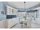 Cozy breakfast nook with a charming round table and bright, natural lighting at 11 Amberjack Ln, Placida, FL 33946