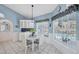 Inviting breakfast nook with an airy atmosphere and views of the pool at 11 Amberjack Ln, Placida, FL 33946