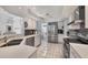 Clean, well-lit kitchen with stainless steel appliances and white cabinetry at 11 Amberjack Ln, Placida, FL 33946