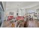 Bright and airy living space with hardwood floors, comfortable seating, and dining room area at 11 Amberjack Ln, Placida, FL 33946