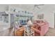 Well-lit living space with a sliding glass doors and comfortable seating overlooking the lanai at 11 Amberjack Ln, Placida, FL 33946