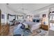 Spacious main bedroom with a ceiling fan, and views from several windows at 11 Amberjack Ln, Placida, FL 33946