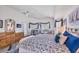 Spacious main bedroom with a ceiling fan, and views from several windows at 11 Amberjack Ln, Placida, FL 33946