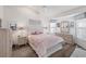 Beach-themed bedroom with a flamingo-themed comforter and light wood furniture at 11 Amberjack Ln, Placida, FL 33946