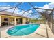 Backyard pool with covered lanai area at 11008 Waterford Ave, Englewood, FL 34224
