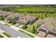A neighborhood of beautiful single-Gathering homes with well-maintained lawns and landscaping at 11125 Mcdermott Ct, Englewood, FL 34223