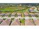 Neighborhood boasts well-kept lawns, tile roofs, and landscaping creating a serene and upscale living environment at 11125 Mcdermott Ct, Englewood, FL 34223