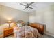 Bedroom featuring neutral walls and a ceiling fan at 11125 Mcdermott Ct, Englewood, FL 34223