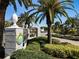 The prestigious Boca Royale Golf & Country Club entrance set amidst lush palms and manicured landscapes at 11125 Mcdermott Ct, Englewood, FL 34223